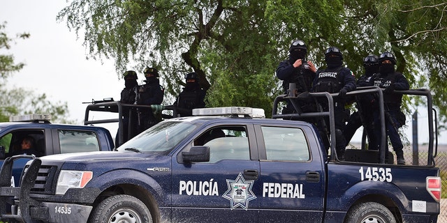 The Federal police escort travelers crossing the dangerous highway of the gang-infested northeastern state of Tamaulipas, from the border with the United States on December 16, 2015.