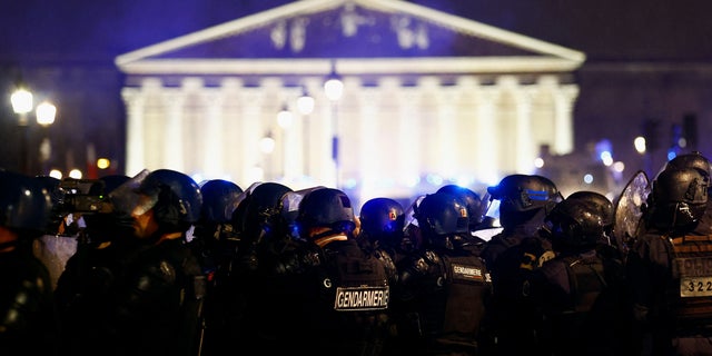 Gendarmerie members stand guard during a demonstration on Place de la Concorde in Paris, France, March 17, 2023. 