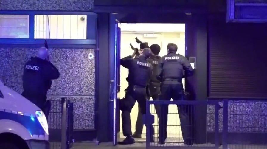 Armed police arrive on scene at Hamburg shooting in Germany