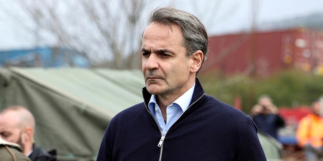 Greek Prime Minister Kyriakos Mitsotakis visited the site of a crash, where two trains collided, near the city of Larissa, Greece, on Wednesday.