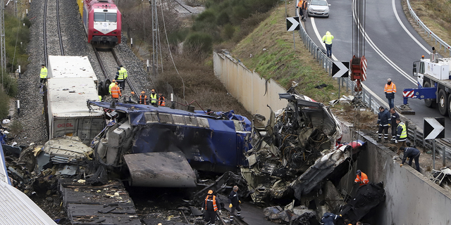 The cause of the crash in Tempe, Greece, remains under investigation, but the country's prime minister says it appears to have happened as a result of "human error."