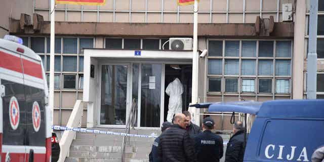 Police arrive at the scene after a local court was attacked with a grenade in Podgorica, Montenegro, on March 3, 2023.