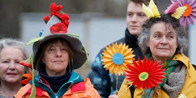 Swiss seniors are protesting outside the European Court of Human Rights on March 29, 2023, in Strasbourg, France. A group of Swiss seniors are taking their government to court to demand more serious action towards combating climate change.