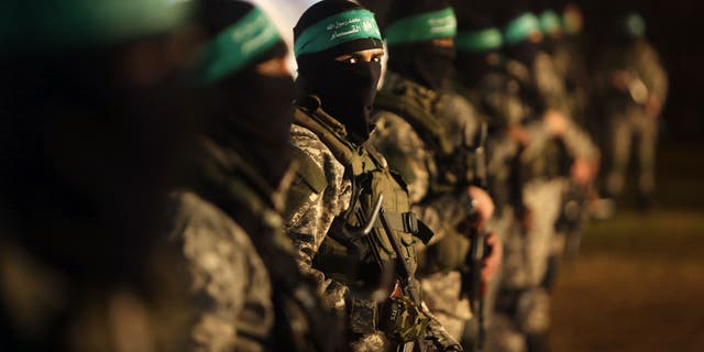 Palestinian members of the Ezzedine al-Qassam Brigades, the armed wing of the Hamas movement, take part in a gathering Jan. 31, 2016, in Gaza City to pay tribute to fellow militants who died after a tunnel collapsed in the Gaza Strip. 