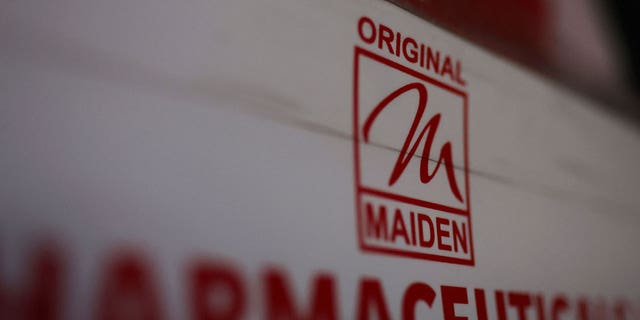 Logo of the Maiden Pharmaceuticals Ltd. company is seen on a board in New Delhi, India, on Oct. 6, 2022. 