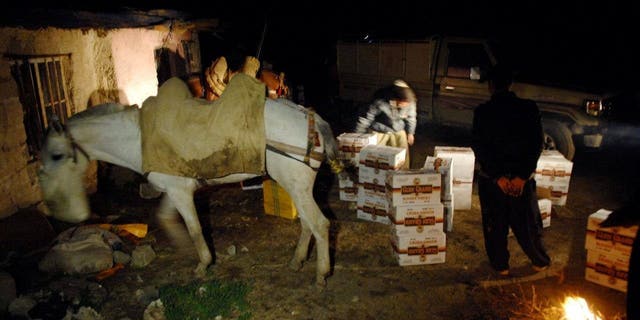 An alcohol smuggling operation at the border near Sulaimaniya, 160 miles northeast of Baghdad, on March 20, 2010. 