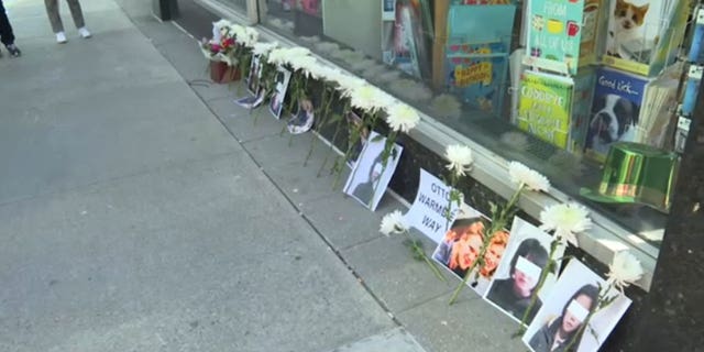 Pictures of victims of the North Korean regime are placed outside the country's U.N. mission in New York.