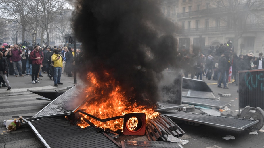 Demonstrators set fire during a protest