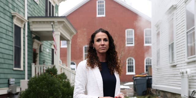 State Sen. Diana DiZoglio poses for a portrait in Newburyport, Mass., Dec. 30, 2021. DiZoglio is sponsoring a bill to outlaw "stealthing." The practice of nonconsensual condom removal is common, but most states' laws are silent on it.  
