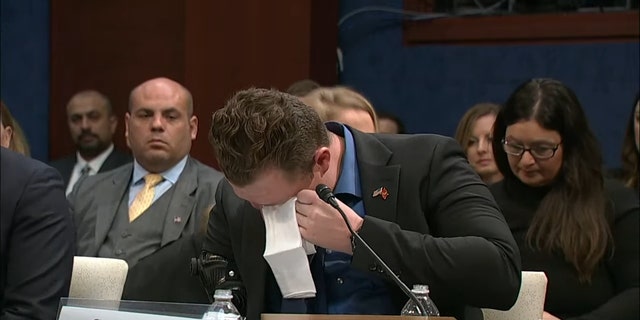 Marine Sgt. Tyler Vargas-Andrews breaks down while testifying before the House Foreign Affairs Committee.
