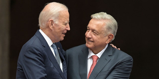 President Biden, left, shakes hands with his Mexican counterpart Andres Manuel Lopez Obrador during a welcome ceremony at Palacio Nacional in Mexico City, on Jan. 9, 2023.