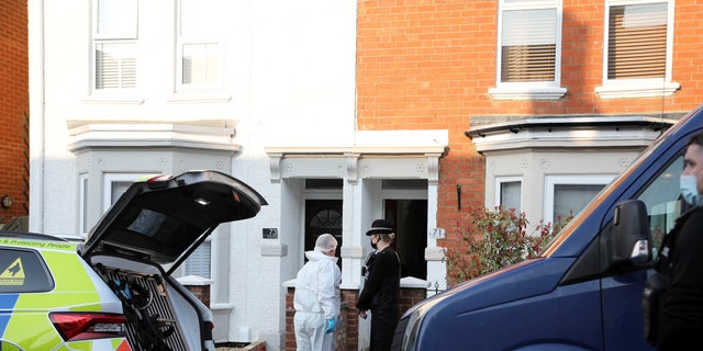 Police forensic officers at the house in Moore Street in Kingsley, Northampton, March 20, 2022.