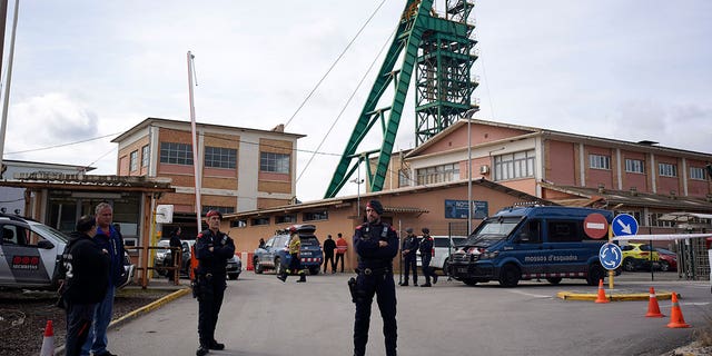 Catalan police cordon off the area at the entrance of the Cabanasses de Súria mine in Spain, on March 9, 2023. Three workers died after becoming trapped deep underground.
