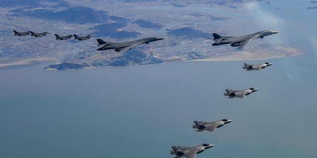 Two U.S. B-1B Lancer strategic bombers, four U.S. Air Force F-16 fighter jets and four South Korean Air Force F-35 fighter jets fly over South Korea on November 19, 2022. 