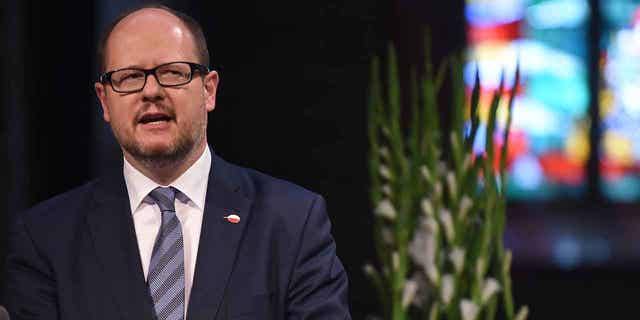 Gdansk mayor Pawel Adamowicz speaks at a commemoration ceremony for late Bremen Mayor Hans Koschnick in Bremen, Germany, on May 4, 2016. A Polish court on March 16, 2023, sentenced Stefan Wilmont to life in prison for fatally stabbing Adamowicz.