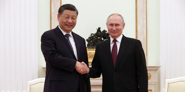 Russian President Vladimir Putin meets with China's President Xi Jinping at the Kremlin in Moscow on March 20, 2023. 