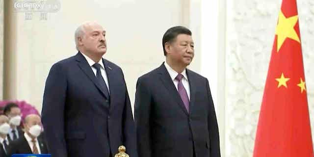 Belarusian President Alexander Lukashenko, left, and Chinese President Xi Jinping attend a welcome ceremony in Beijing, China, on March 1, 2023. The presidents joined Wednesday in urging a cease-fire and negotiations in Russia's war with Ukraine.