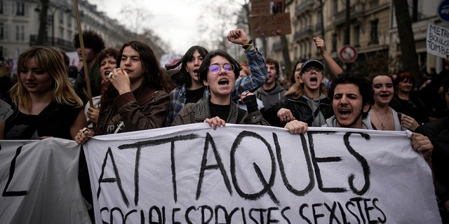 Protesters march during a rally in Paris, on March 23, 2023.