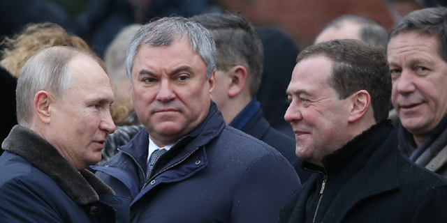 Vyacheslav Volodin, center, the lawmaker who proposed the harsher penalties, is seen with Russian President Vladimir Putin and Deputy Chairman of Security Council Dmitry Medvedev in Moscow in February 2020.
