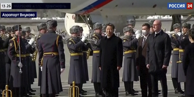 China's President Xi Jinping is seen Monday, March 20 during an official welcome ceremony at the Vnukovo-2 government airport outside Moscow, Russia. Xi is set to meet Russian President Vladimir Putin starting today.