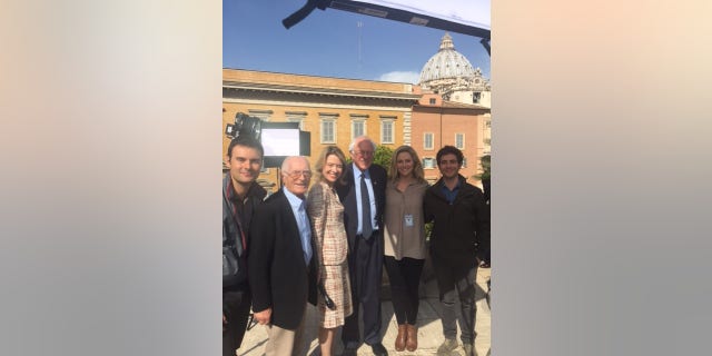 Mario Biasetti, Amy Kellogg and the Rome bureau crew stand with Sen. Bernie Sanders, D-VT.