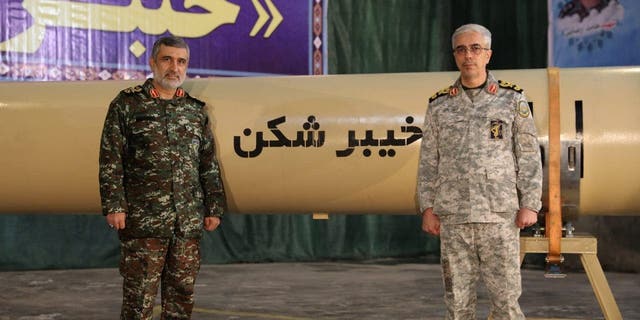 Iranian Armed Forces Chief of Staff Mohammad Bagheri and IRGC Aerospace Force Commander Amir Ali Hajizadeh during the unveiling of "Kheibarshekan" missile in Iran, Feb. 9, 2022.