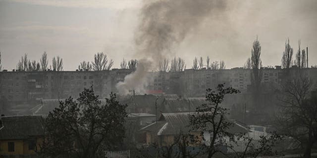 This photograph taken on March 22, 2023 shows smoke rising over the town of Chasiv Yar, near Bakhmut, after a Russian shelling.