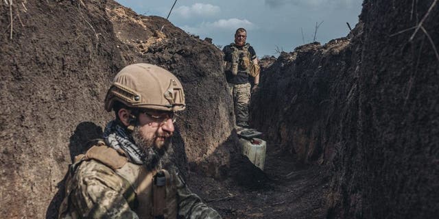 Ukrainian soldiers in a trench in the direction of Bakhmut, Ukraine, March 22, 2023.