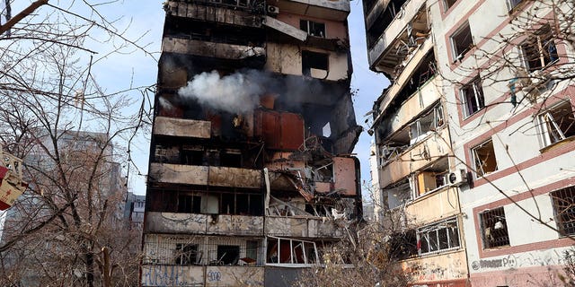 A residential multi-story building becomes damaged after a Russian missile struck it in southeastern city of Zaporizhzhia, Ukraine, on March 22, 2023. 