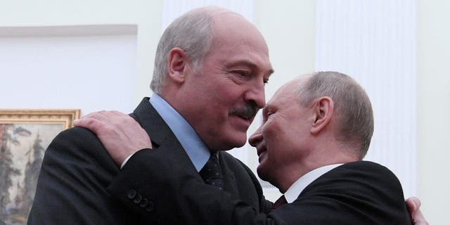 Russian President Vladimir Putin, right, embraces his Belarussian counterpart Alexander Lukashenko during a meeting in Moscow Dec. 29, 2018.