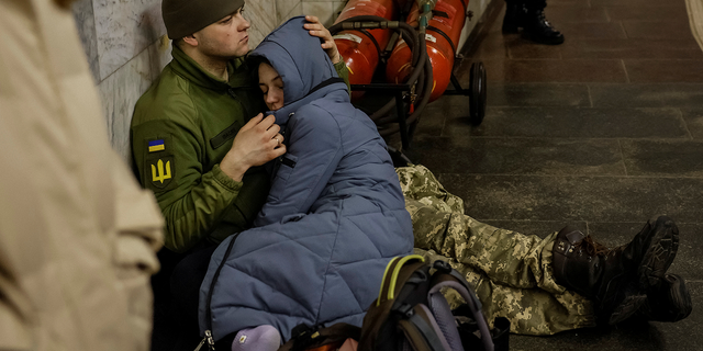 People shelter inside a subway station during a Russian missile attack in Kyiv, Ukraine, on Thursday, March 9.