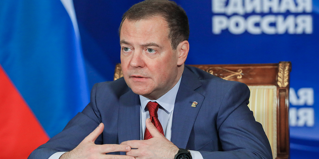 Russian Security Council Deputy Chairman and the head of the United Russia party Dmitry Medvedev chairs a meeting on saving businesses and jobs in foreign companies via video link at Gorki state residence, outside Moscow on March 16.