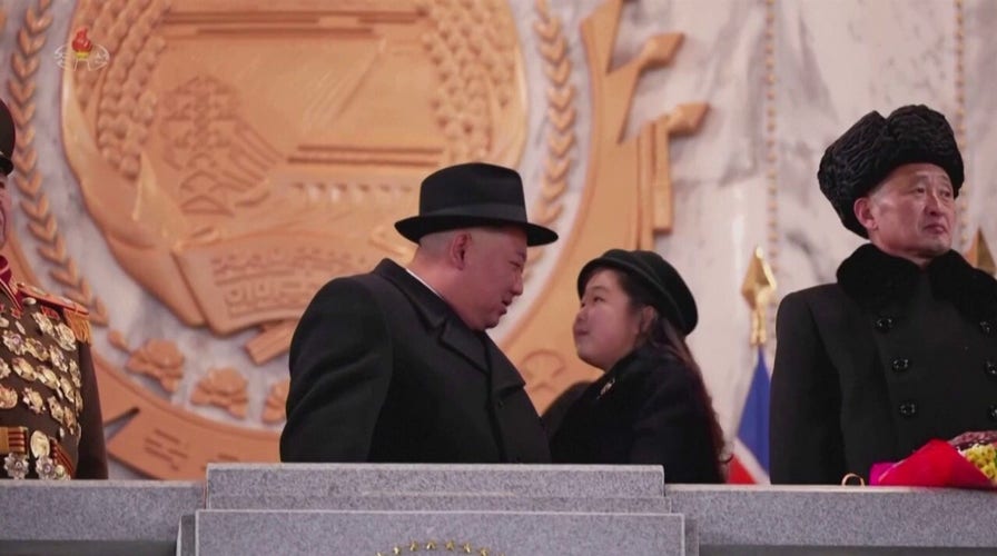 North Korea's Kim Jong Un seen with 10-year-old daughter at military parade