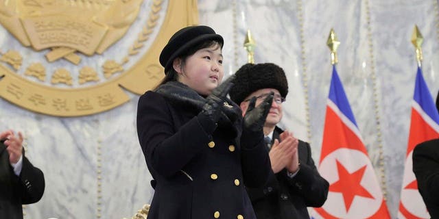 The daughter of Kim Jong Un, reportedly named Kim Ju-Ae and aged about 10, attends a military parade to mark the 75th anniversary of the Korean People's Army on Kim Il Sung Square in Pyongyang, Feb. 8, 2023.