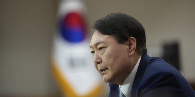 South Korean President Yoon Suk Yeol speaks during an interview at the presidential office in Seoul, South Korea.
