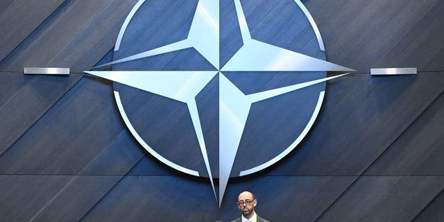 The NATO logo is pictured inside the new North Atlantic Council meeting room at the new NATO headquarters during a press tour of the facilities.