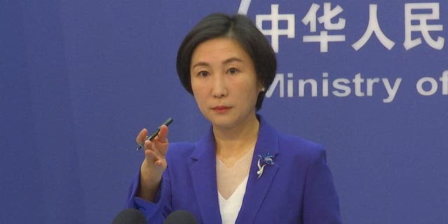 Chinese Foreign Ministry spokesperson Mao Ning gestures during a press conference at the Ministry of Foreign Affairs in Beijing.