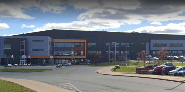 Three people were stabbed at Charles P. Allen High School in Bedford, Nova Scotia, Canada, early Monday. A student was taken into custody.