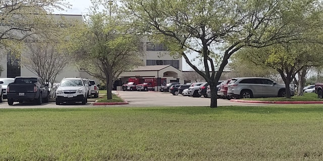 Two ambulances sit in front of Valley Regional Medical Center Tuesday, March 7, 2023. The ambulances transferred two of the four people who were taken at gunpoint on Friday in Matamoros.