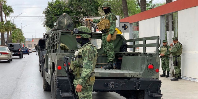 Mexican army soldiers prepare a search mission for four U.S. citizens kidnapped by gunmen in Matamoros, Mexico.