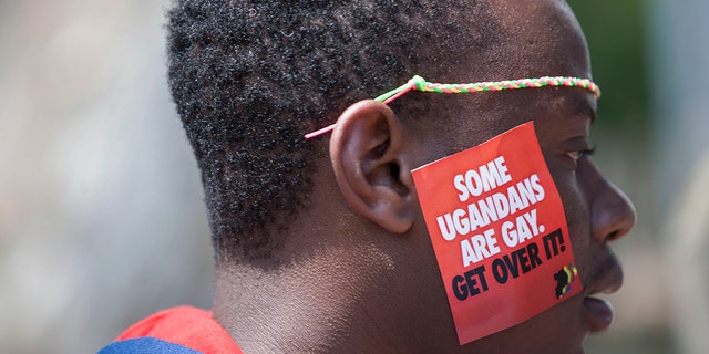 A Ugandan man is seen during the third Annual Lesbian, Gay, Bisexual and Transgender (LGBT) Pride celebrations in Entebbe, Uganda on Aug. 9, 2014.