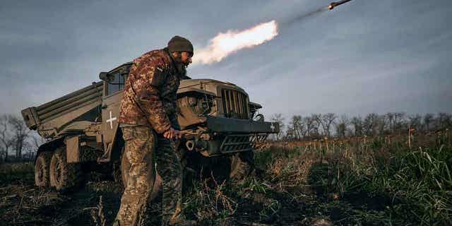 A Ukrainian military unit fires rockets at Russian positions in the frontline near Bakhmut, Donetsk region, Ukraine, Nov. 24, 2022.