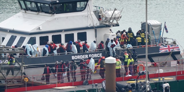A group of people thought to be migrants are brought in to Dover, Kent, onboard a Border Force vessel following a small boat incident in the English Channel. Picture date: Monday, March 6, 2023.