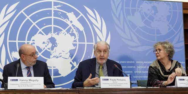 Brazilian Paulo Pinheiro, center, Chairperson of the Commission of Inquiry on Syria, talks to the media during a press conference at the European headquarters of the United Nations in Geneva, Switzerland, on March 13, 2023. A United Nations commission claims the Syrian government and the international community did not act quickly with earthquake recovery efforts.