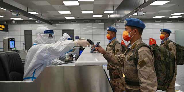 Chinese peacekeepers to be stationed in Juba, South Sudan, in a United Nations peacekeeping mission are pictured at an airport in Zhengzhou, China, on Dec. 6, 2022.  The U.N. Peacekeepers condemned South Sudan for sending troops to the Abyei region.