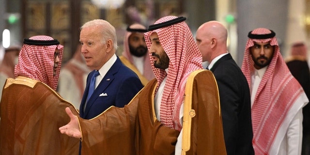 President Biden, center left, and Saudi Crown Prince Mohammed bin Salman, center, arrive during the Jeddah Security and Development Summit at a hotel in Saudi Arabia's Red Sea coastal city of Jeddah July 16, 2022. 