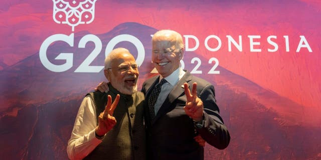 President Biden, right, gestures with India's Prime Minister Narendra Modi before the Partnership for Global Infrastructure and Investment meeting at the G20 summit, Tuesday, Nov. 15, 2022, in Nusa Dua, Bali, Indonesia.