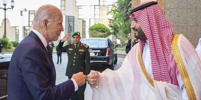 President Joe Biden, left, is welcomed by Saudi Arabian Crown Prince Mohammed bin Salman Al Saud in Jeddah, Saudi Arabia, on July 15, 2022.