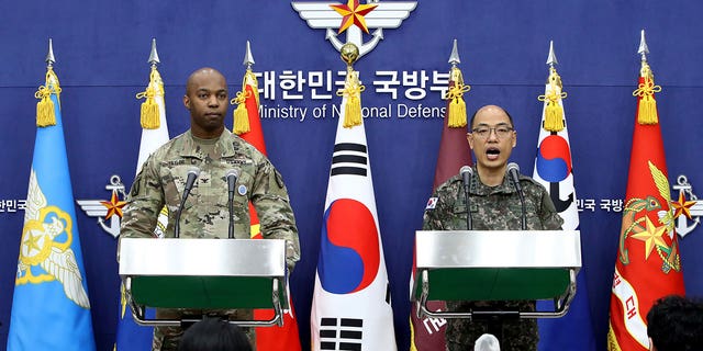 Col. Isaac Taylor, left, of the United Nations Command, Combined Forces Command, and United States Forces Korea and Col. Lee Sung-jun of South Korea's Joint Chiefs of Staff attend a press briefing on March 3, 2023, in Seoul, South Korea. The U.S. and South Korea will hold its annual combined training this month.