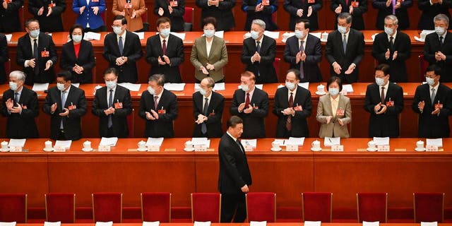 China's President Xi Jinping arrives for the second plenary session of the National People's Congress at the Great Hall of the People in Beijing on March 7, 2023.